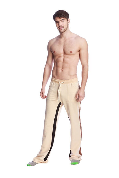 Beige tri-color stretch eco-track and yoga sweat pants with black side stripes and drawstring waistband in sand color