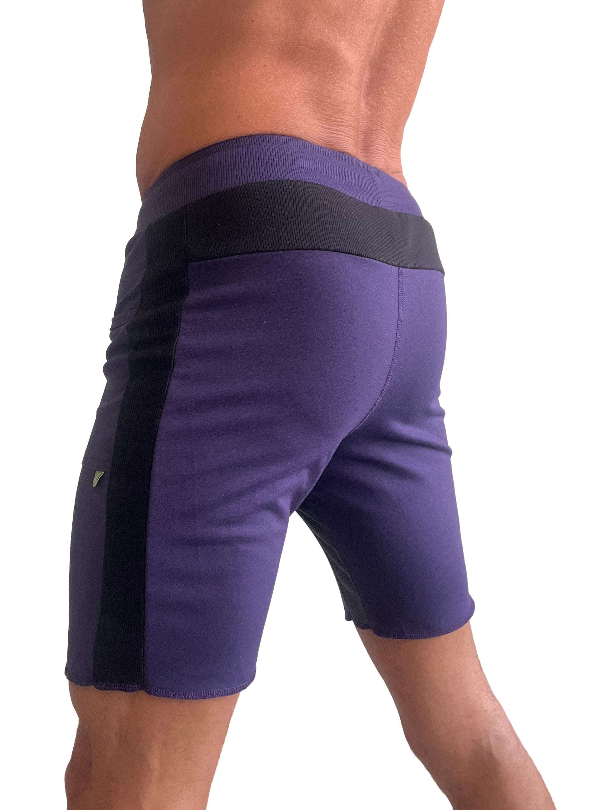 Purple tri-color ultra-flex yoga track shorts with black side panels and elastic waistband for athletic use