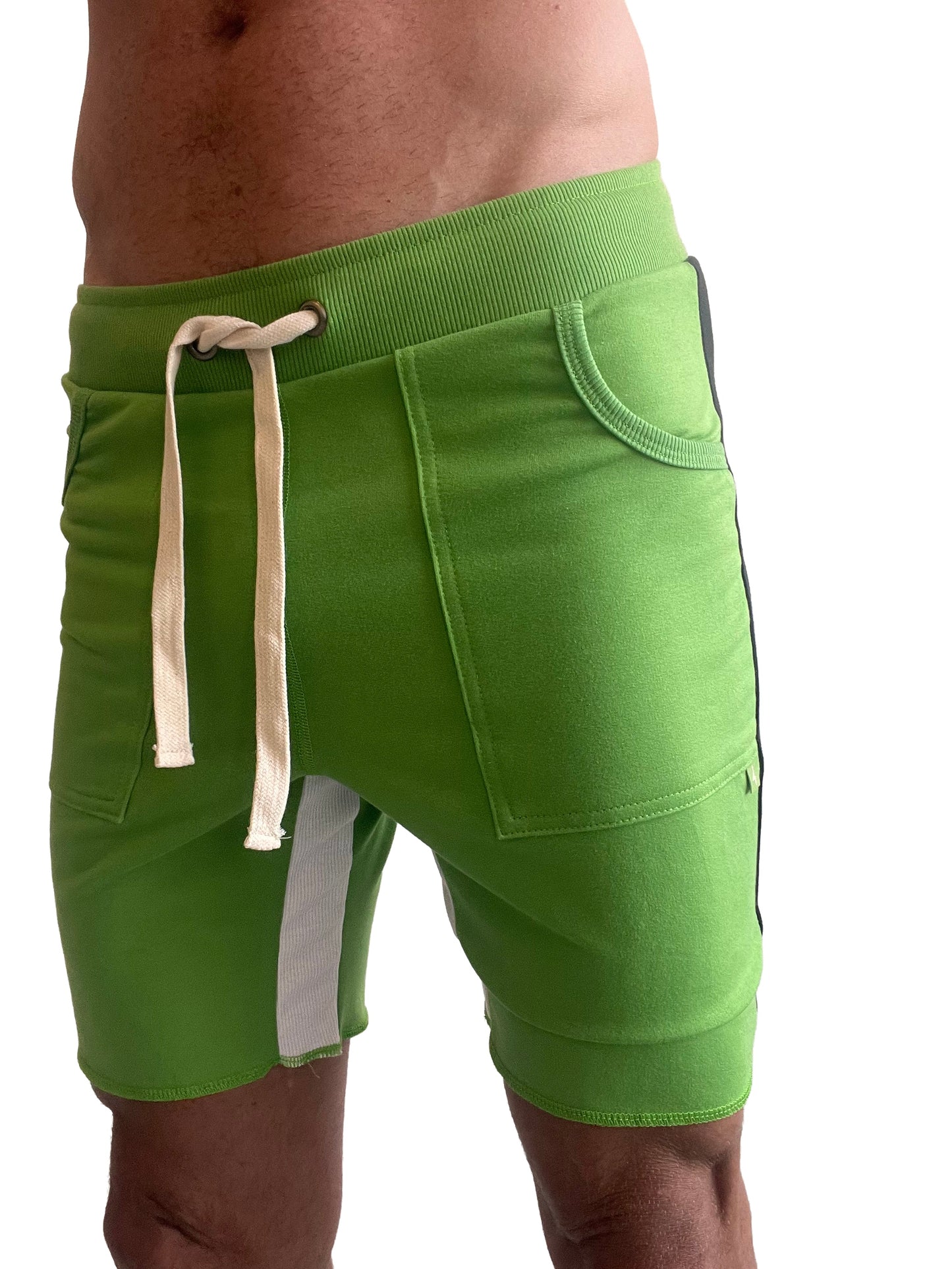 Tri-color ultra-flex yoga track short in bright green with ribbed waistband cream drawstrings and black side stripes
