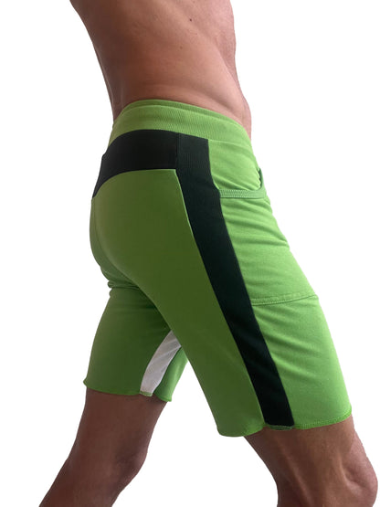 Vibrant lime green tri-color ultra-flex yoga track shorts with bold black and white side panels for athletic wear