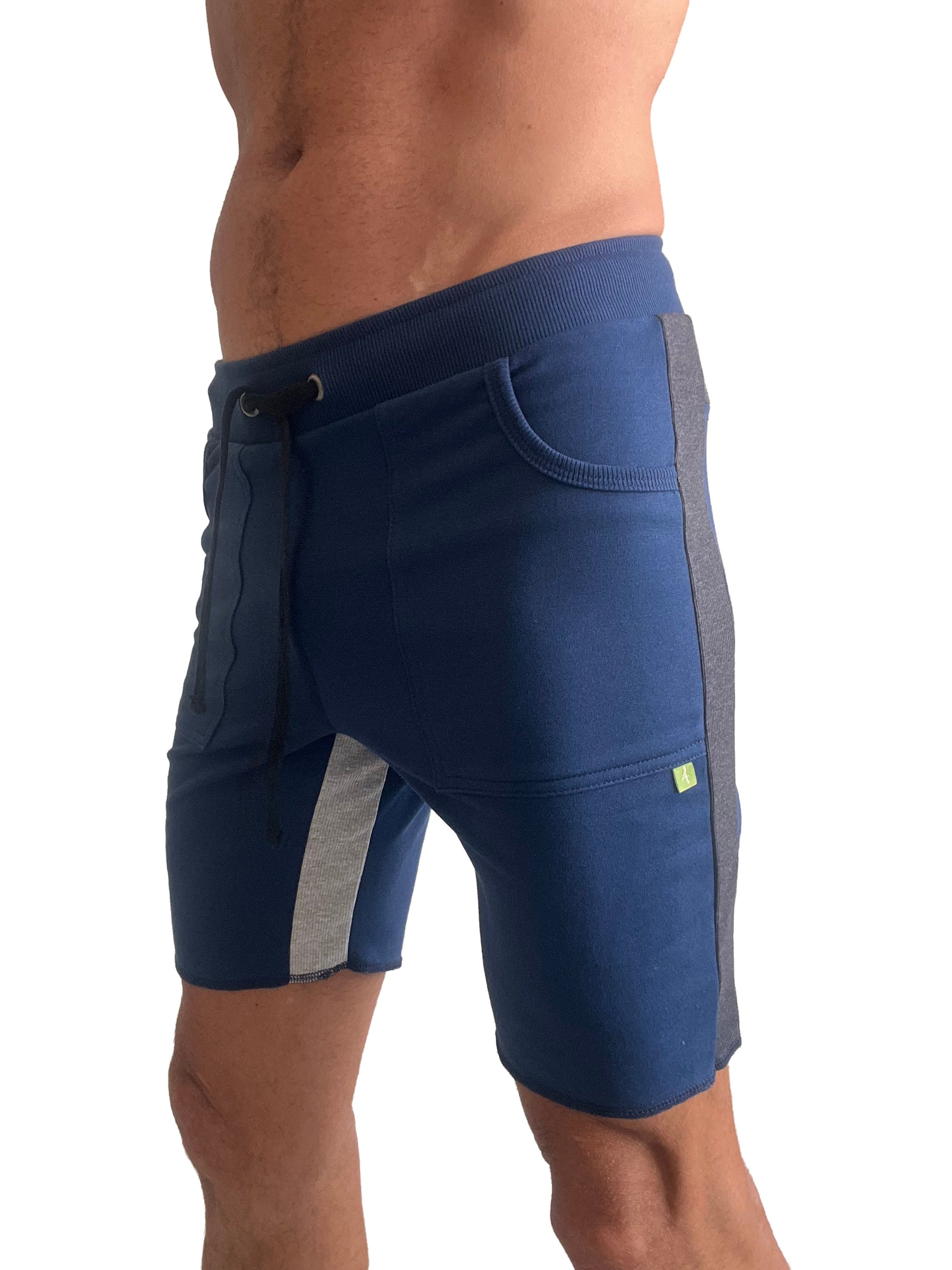 Navy blue tri-color ultra-flex yoga track shorts with gray side panels and green logo on the thigh