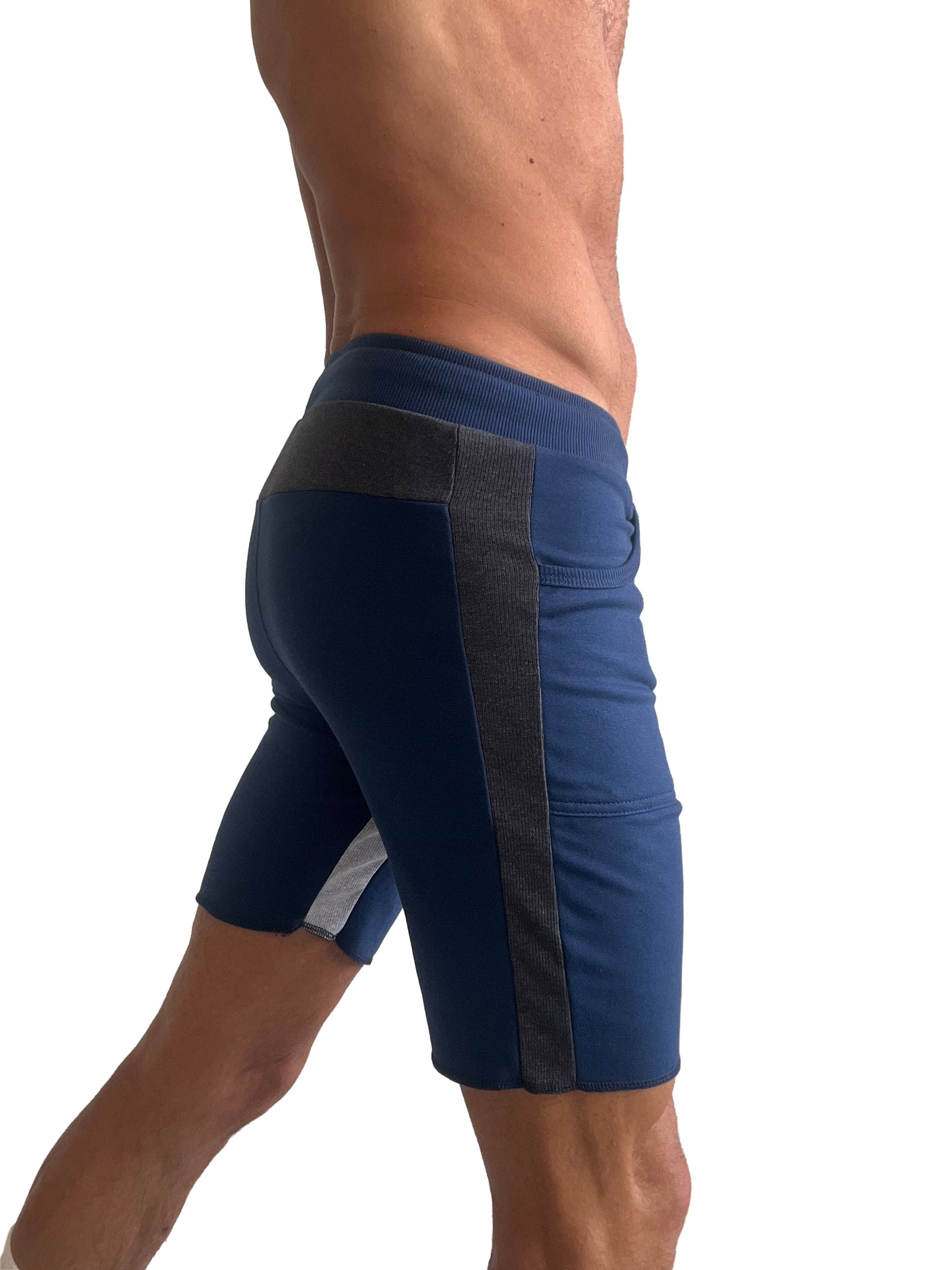 Navy blue tri-color ultra-flex yoga track shorts with dark gray stripe and white hem accent for athletic use