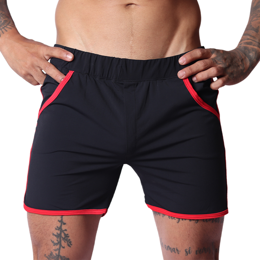 Front view of Gigo Typer black shorts with red trim, athletic stretch fabric, elastic waistband, and minimalist style.