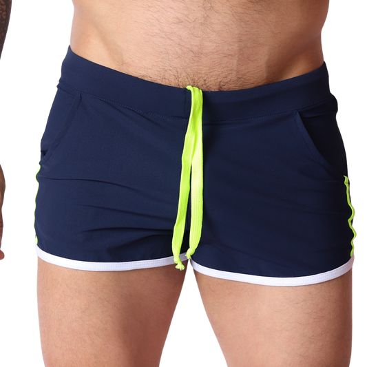 Front view of Gigo Typerhot navy blue athletic shorts with neon green drawstring and white hem trim.