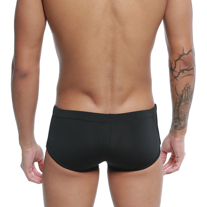 Black men’s swim trunks u-station brazilian trunk black u0005-001 with smooth form-fitting design front view