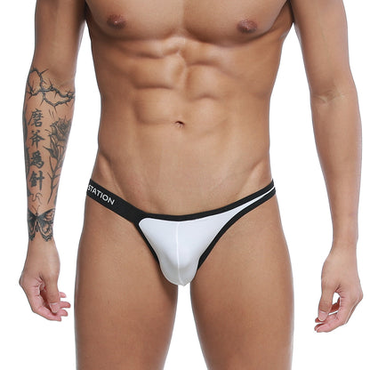 White and black u-station calypso bikini white u0012-100 thong with a sleek minimalist design shown from the back