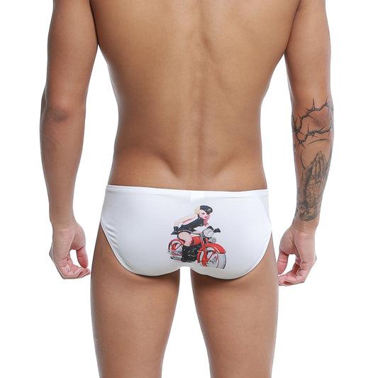 White swim trunks featuring a red motorcycle and pin-up girl graphic from the u-station rider bikini u0022-110 collection