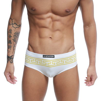 White u station briefs with a yellow Greek key pattern waistband from the u station Greek bikini gold U0042 110 collection