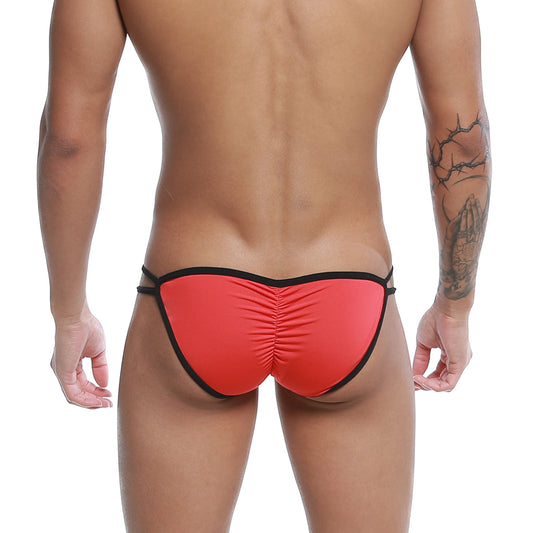 Back view of u-station skeleton bikini red u0062-600 thong with ruched back and elastic waistband in red and black