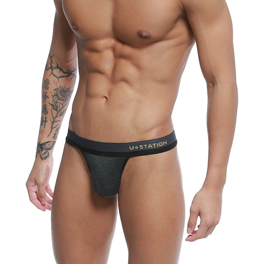 Black u station brand talent thong with subtle heathered texture and gold lettering on waistband gray u0104-013