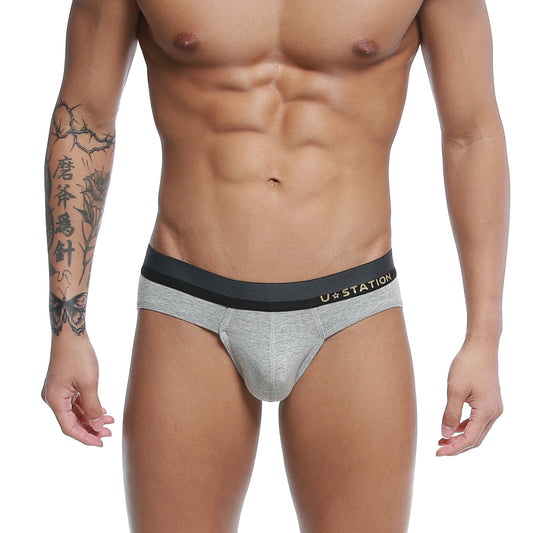 Gray heathered briefs with black elastic waistband and gold ustation logo in u station adam brief gray u0122-020