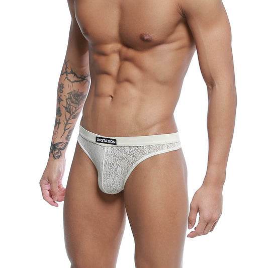 Ivory white lace thong with black uastation brand label on waistband u station love thong ivory u0404-101
