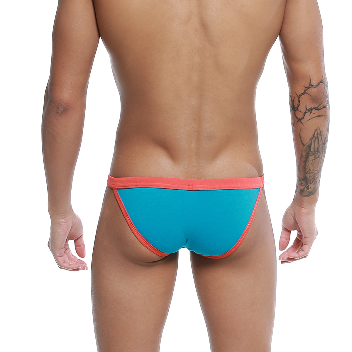 U-Station Frisa bikini turquoise men’s briefs in bright turquoise and coral with a snug form-fitting design