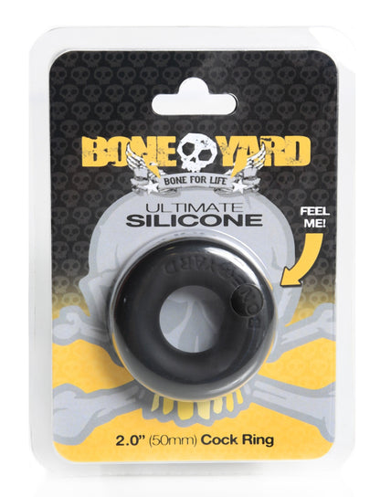 Black silicone cock ring from Bone Yard with smooth circular design and embossed skull logo, ultimate silicone ring black