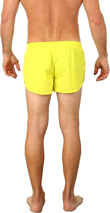 Bright yellow UZZI running short swim trunks made of lightweight material for comfortable active use