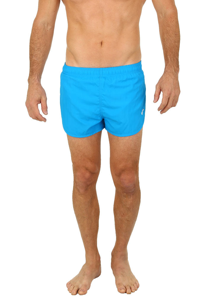 Bright blue Uzzi running short swim trunks with a simple design and small logo on the lower right leg