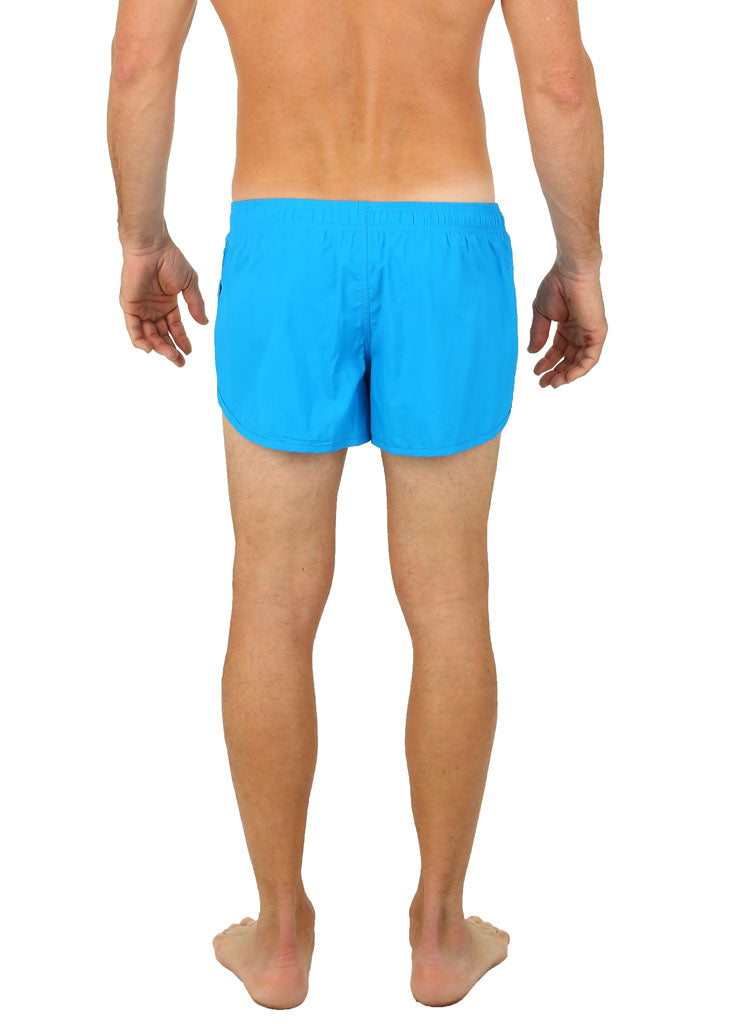 Bright blue UZZI running short swim trunks with a simple solid design ideal for athletic and casual use