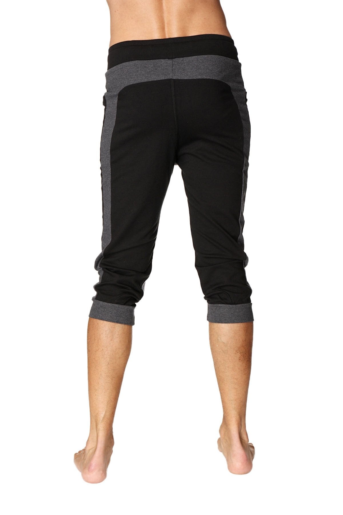 Black and gray ultra-flex tri-color cuffed yoga pants with ribbed waistband side heathered gray panels and rolled cuffs