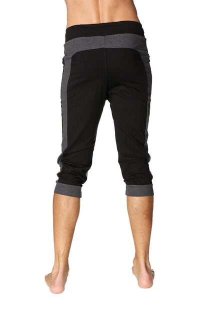 Black and gray ultra-flex tri-color cuffed yoga pants with ribbed waistband side heathered gray panels and rolled cuffs