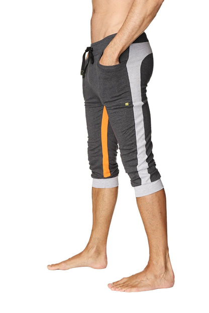 Ultra-flex tri-color cuffed yoga pant in charcoal with grey and orange featuring elastic cuffs and drawstring waistband