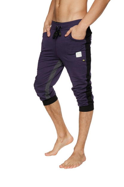 Ultra-Flex tri-color cuffed yoga pant in eggplant with black side panels and elastic cuffs in capri-length style