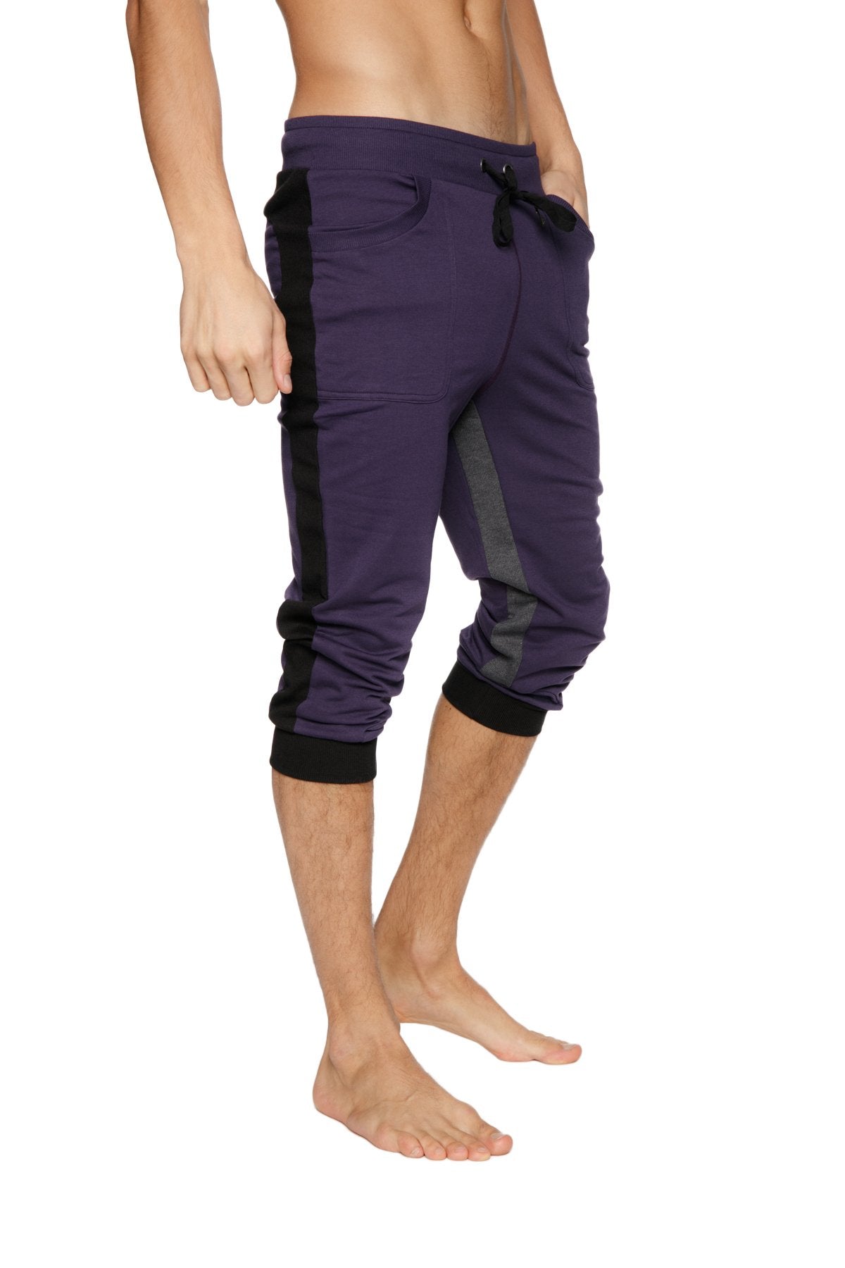 Ultra-flex tri-color cuffed yoga pant in eggplant with black side stripes and elastic cuffs for athletic wear