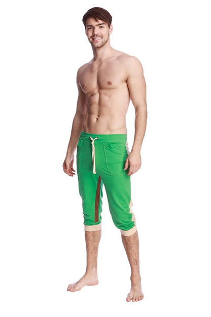 Green ultra-flex tri-color cuffed yoga pant with white drawstring and side panels in capri length