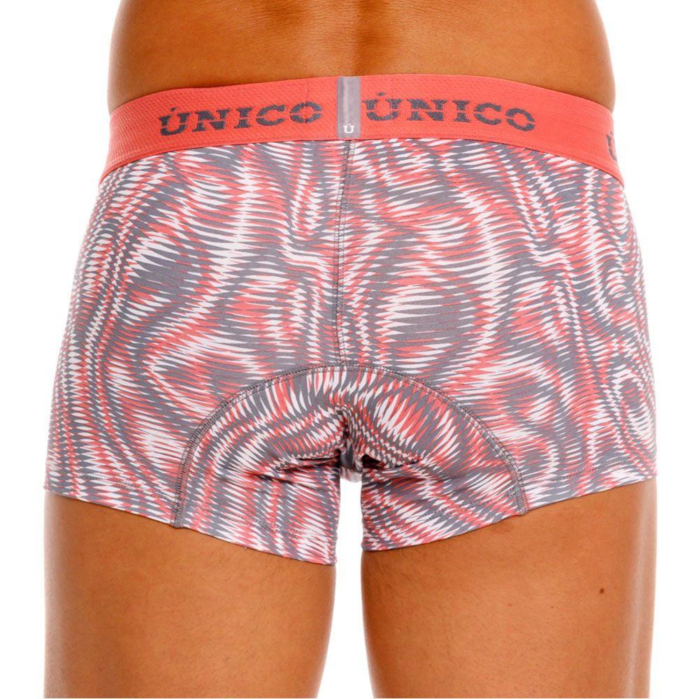 A pair of unico 26020100116 acanalado trunks in pink with a dynamic swirl pattern and orange waistband for men