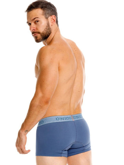 Unico 26040100117 classic trunks in teal with light blue elastic waistband featuring unico logo for everyday wear