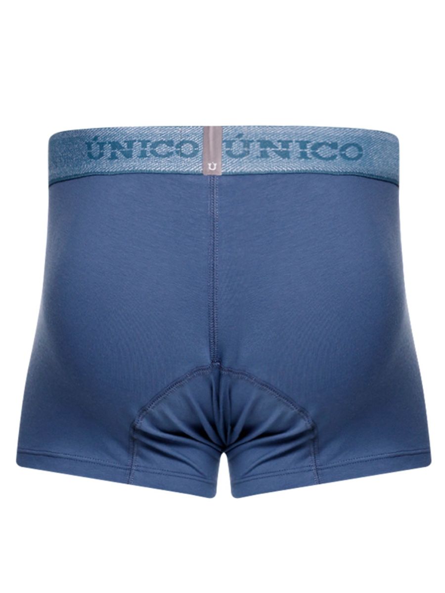 Blue unico brand boxer briefs in teal with matching waistband featuring brand name and logo for everyday wear