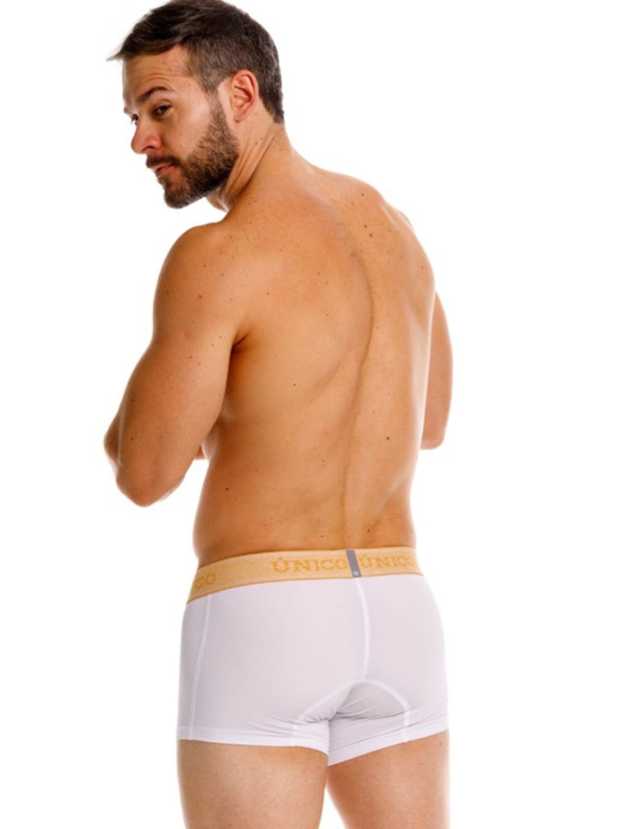 White mens briefs with light beige waistband embossed with unico in gold premium athletic fit amber trunks