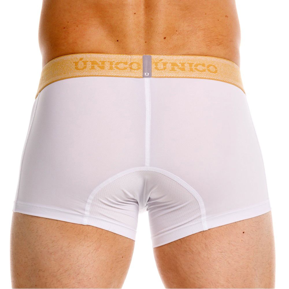 White unico boxer briefs with gold waistband and matching brand name lettering premium athletic fit trunks