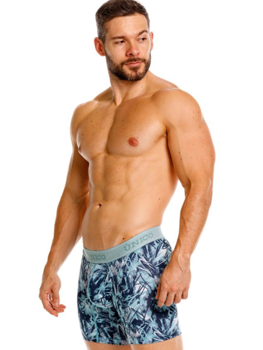 Men’s blue and teal tropical leaf pattern boxer briefs with light gray unico waistband in color 43-Blue
