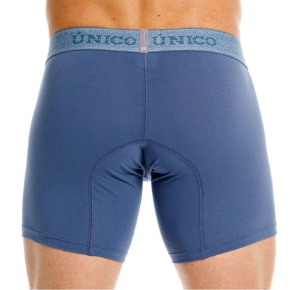 Blue unico men’s boxer briefs in teal with a textured waistband featuring the unico logo for premium comfort and style