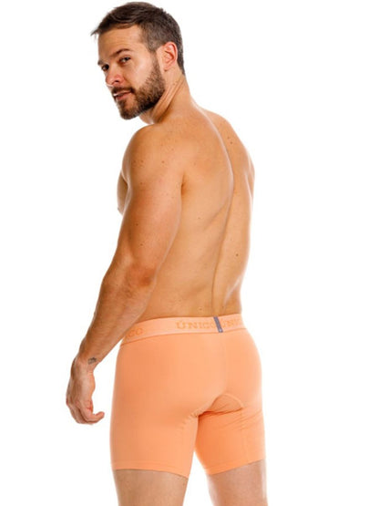 Unico classic boxer briefs in apricot with subtle brand logo on waistband offering essential comfort