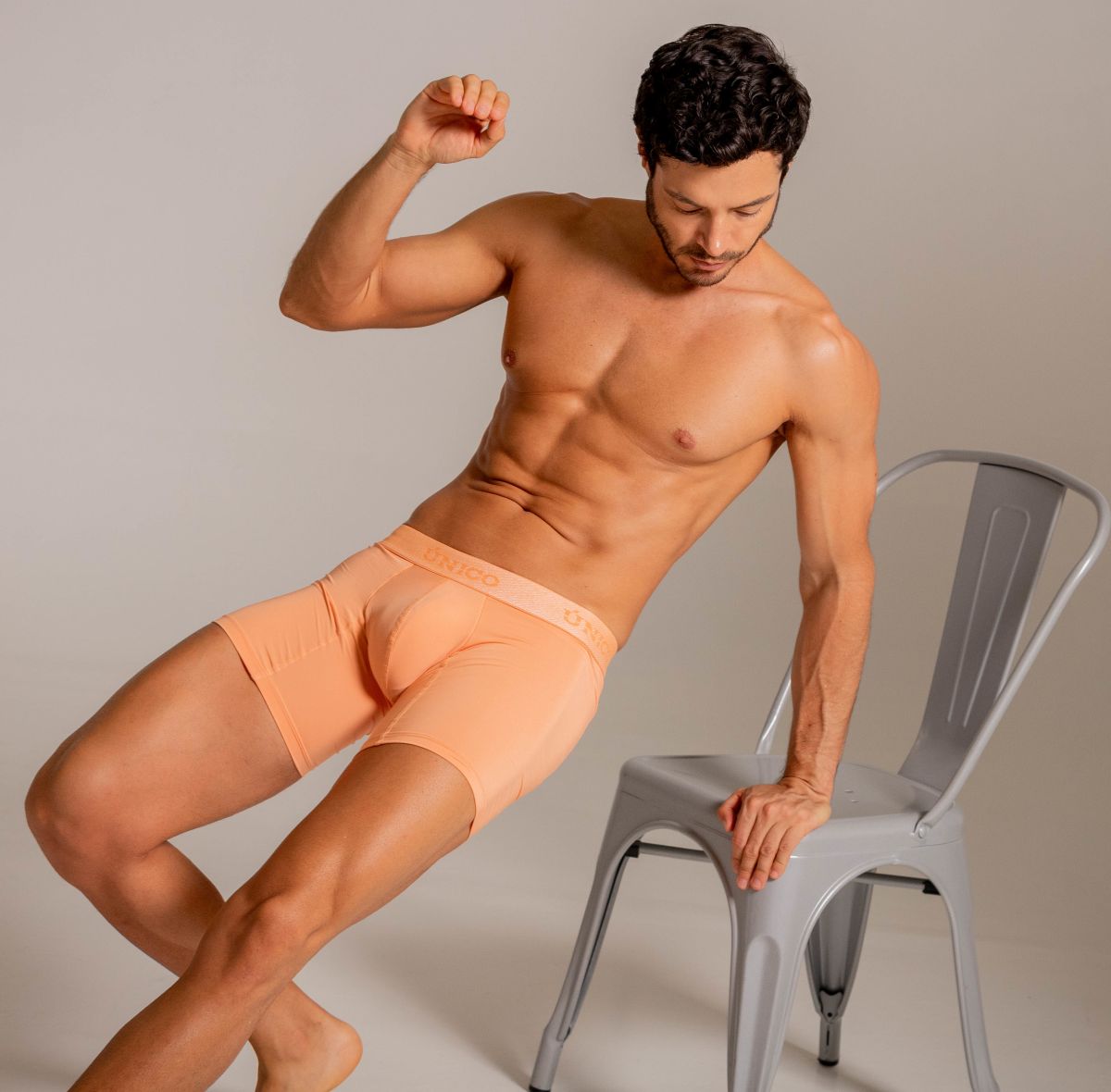 Peach-colored unico 26040100222 classic boxer briefs with smooth stretch fabric for essential comfort in apricot