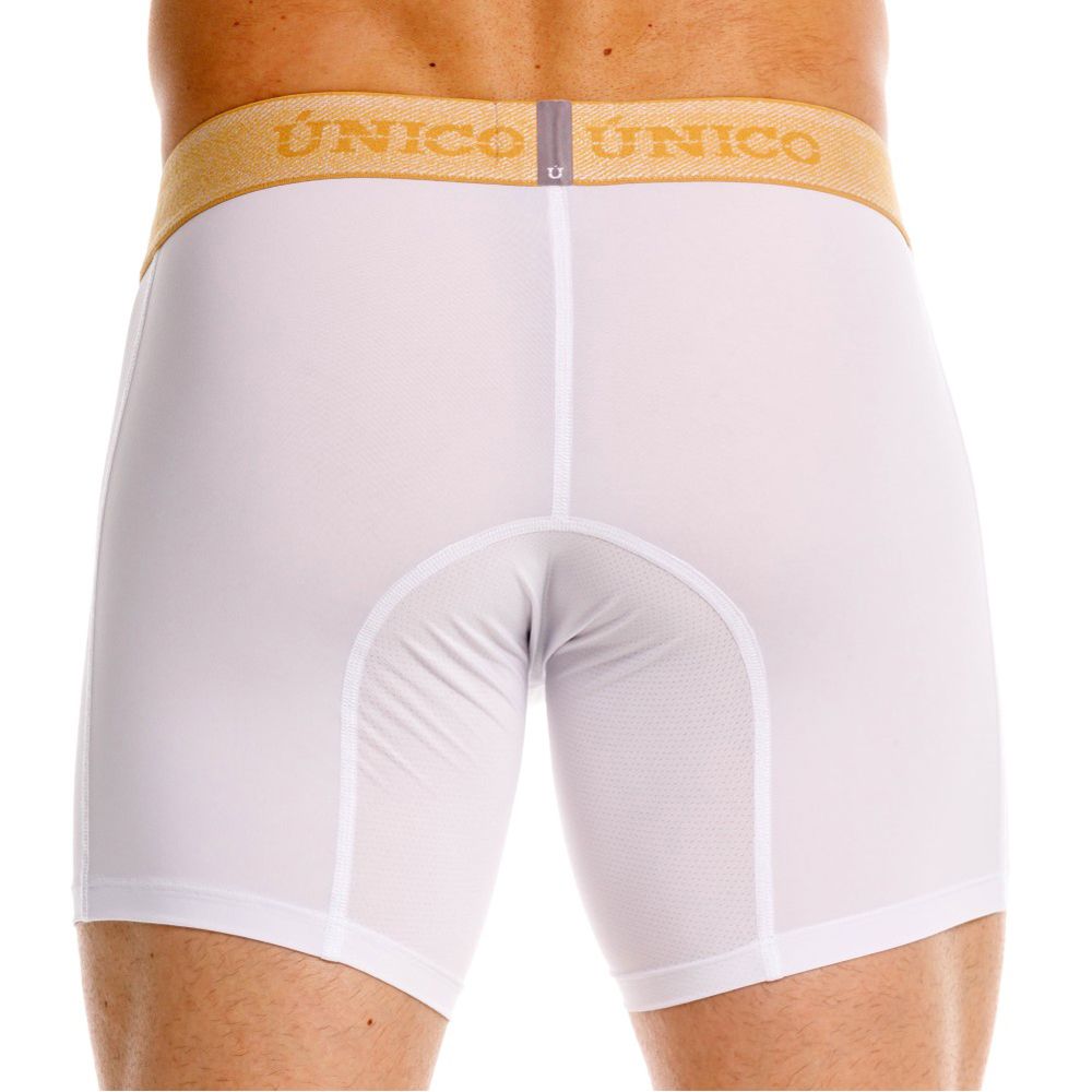 White unico boxer briefs with premium comfort featuring a gold waistband with brand name in matching lettering