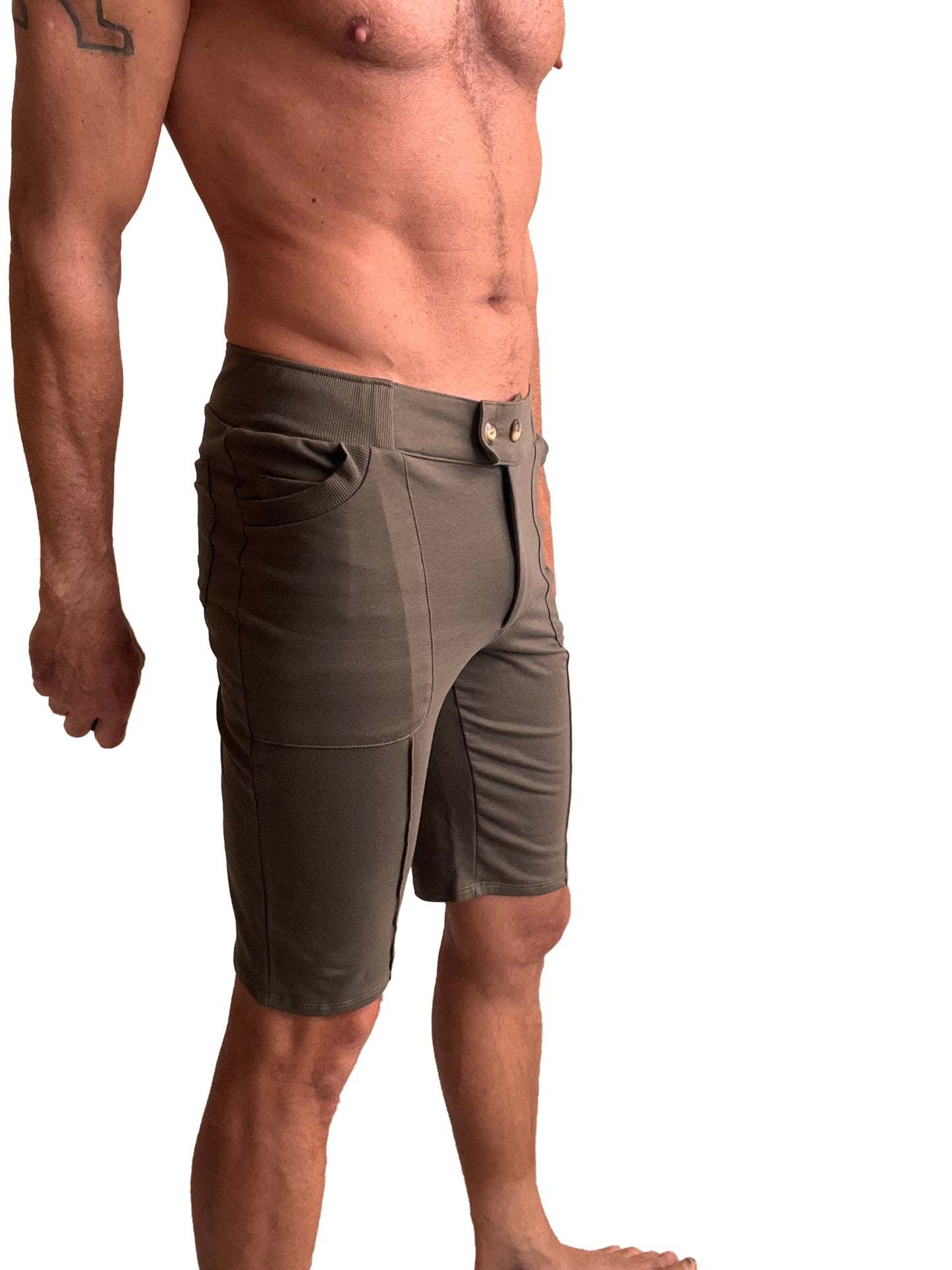 Olive green cargo shorts with multiple pockets and button closure from urban tactical at home dress shorts collection