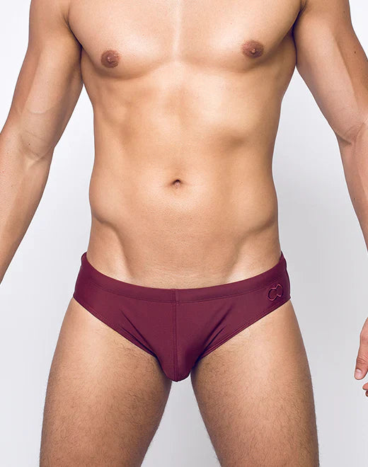 Maroon v10 core bikini swim trunks with a subtle logo on the waistband ideal for beach and pool use
