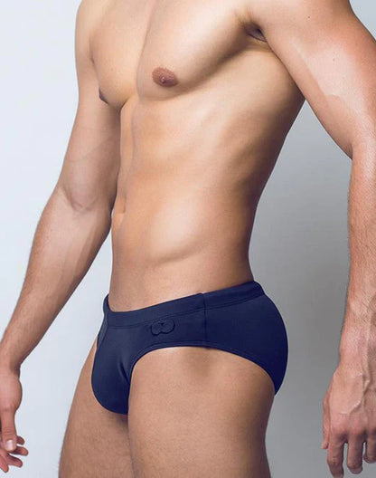 Navy blue v10 core bikini men’s briefs with subtle textured pattern and small embroidered logo on front waistband