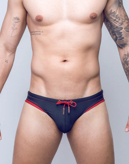 V22 rapid swim brief navy blue swim trunks with red trim and matching red drawstring tie at the front