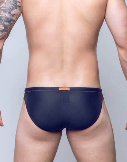 Navy blue V22 rapid swim briefs with red stitching and an orange brand tag at the waistband for quick drying