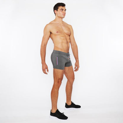 Gray vault gym-tech shorts with drawstring waist and subtle vertical stripe detailing featuring 3 color heat weld zippers
