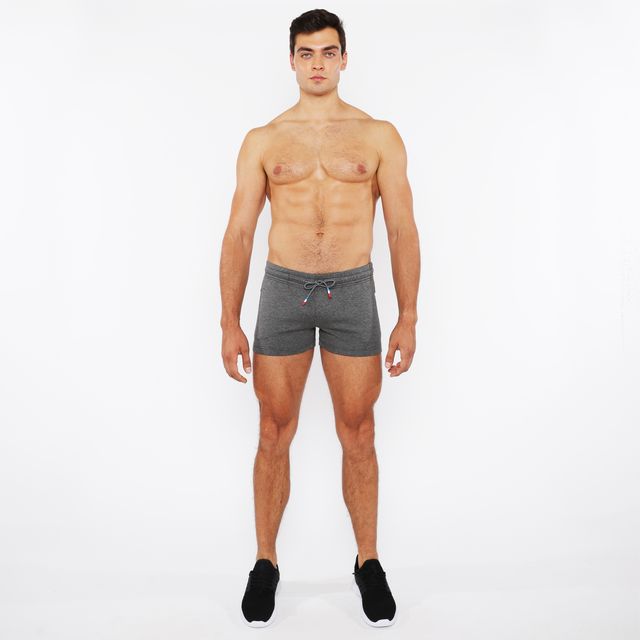 Gray heathered vault gym-tech shorts with drawstring waistband and three color heat weld red accent zippers