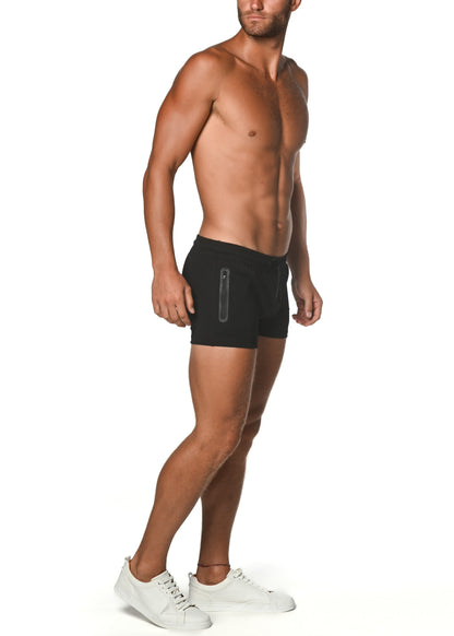 Black vault gym-tech stretch shorts with heat weld zippers feature a sleek design and subtle vertical side zipper detail