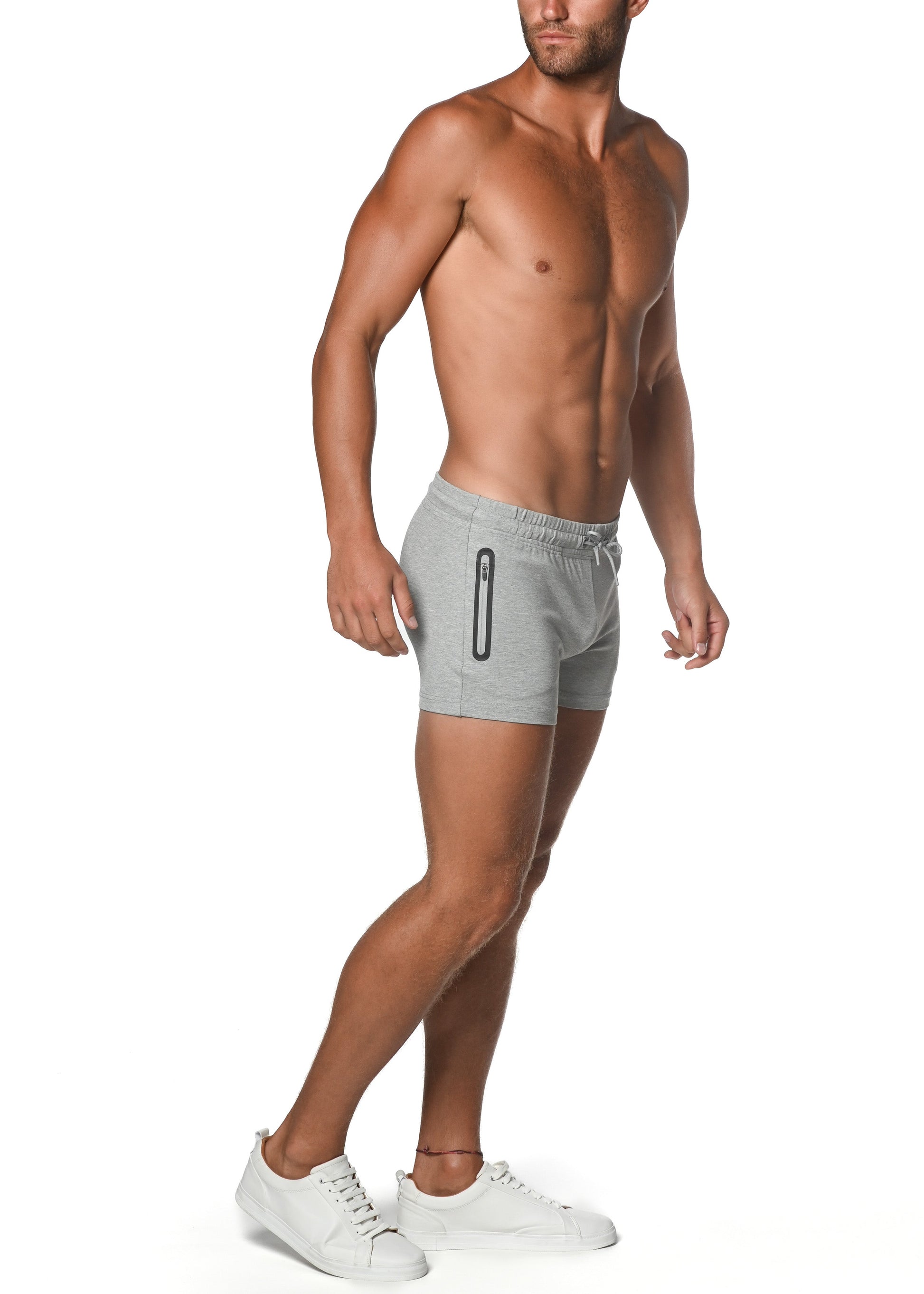 Gray vault gym-tech stretch shorts with black heat weld zippers for athletic use featuring side zipper detail