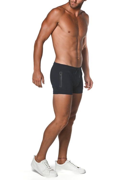 Black vault gym-tech stretch shorts with heat weld side zipper pocket and drawstring waistband for athletic use