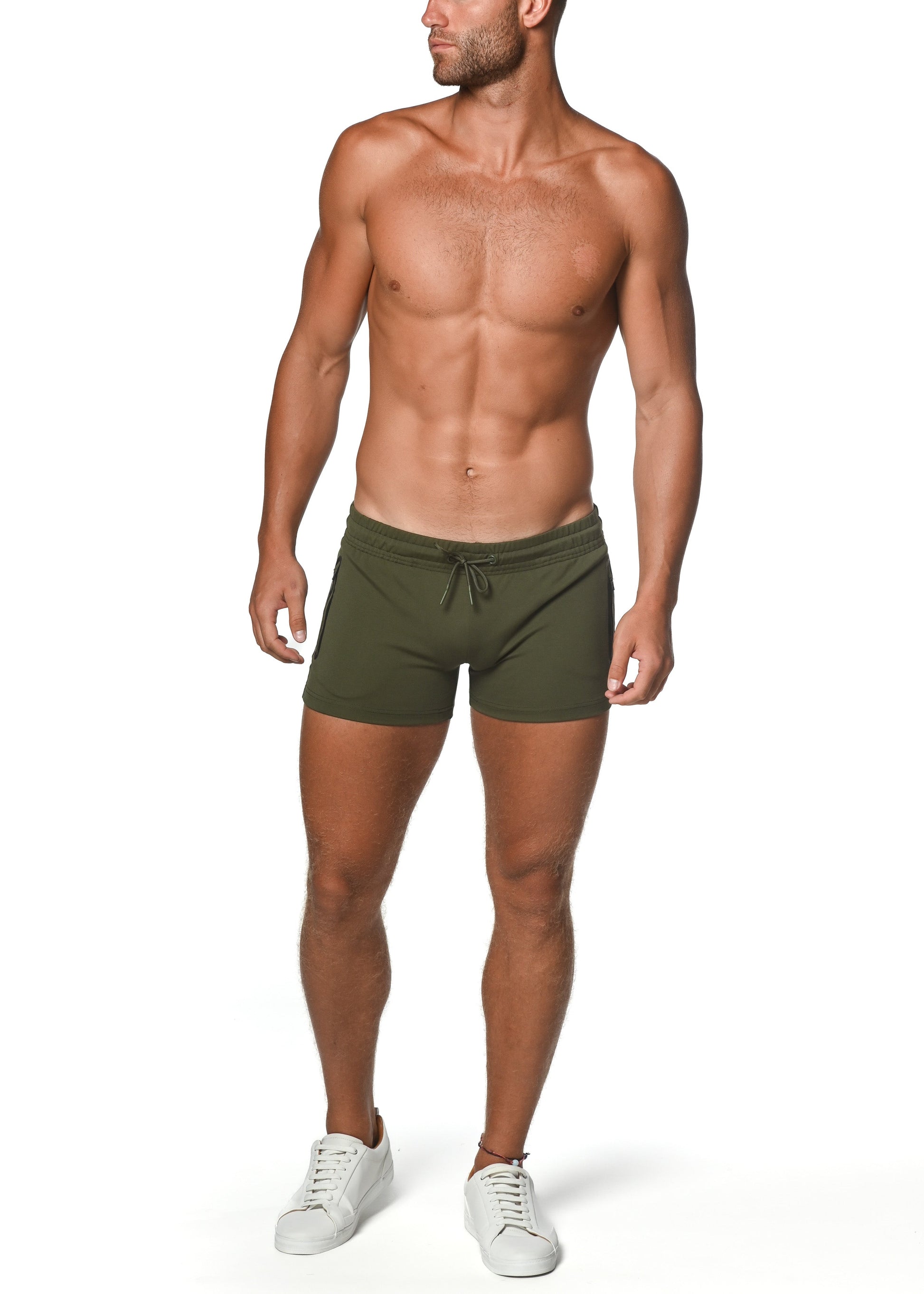 Olive green vault gym-tech stretch swim trunks with heat weld zippers and drawstring waistband