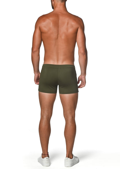 Olive green vault gym-tech stretch briefs featuring heat weld zippers for enhanced comfort and performance