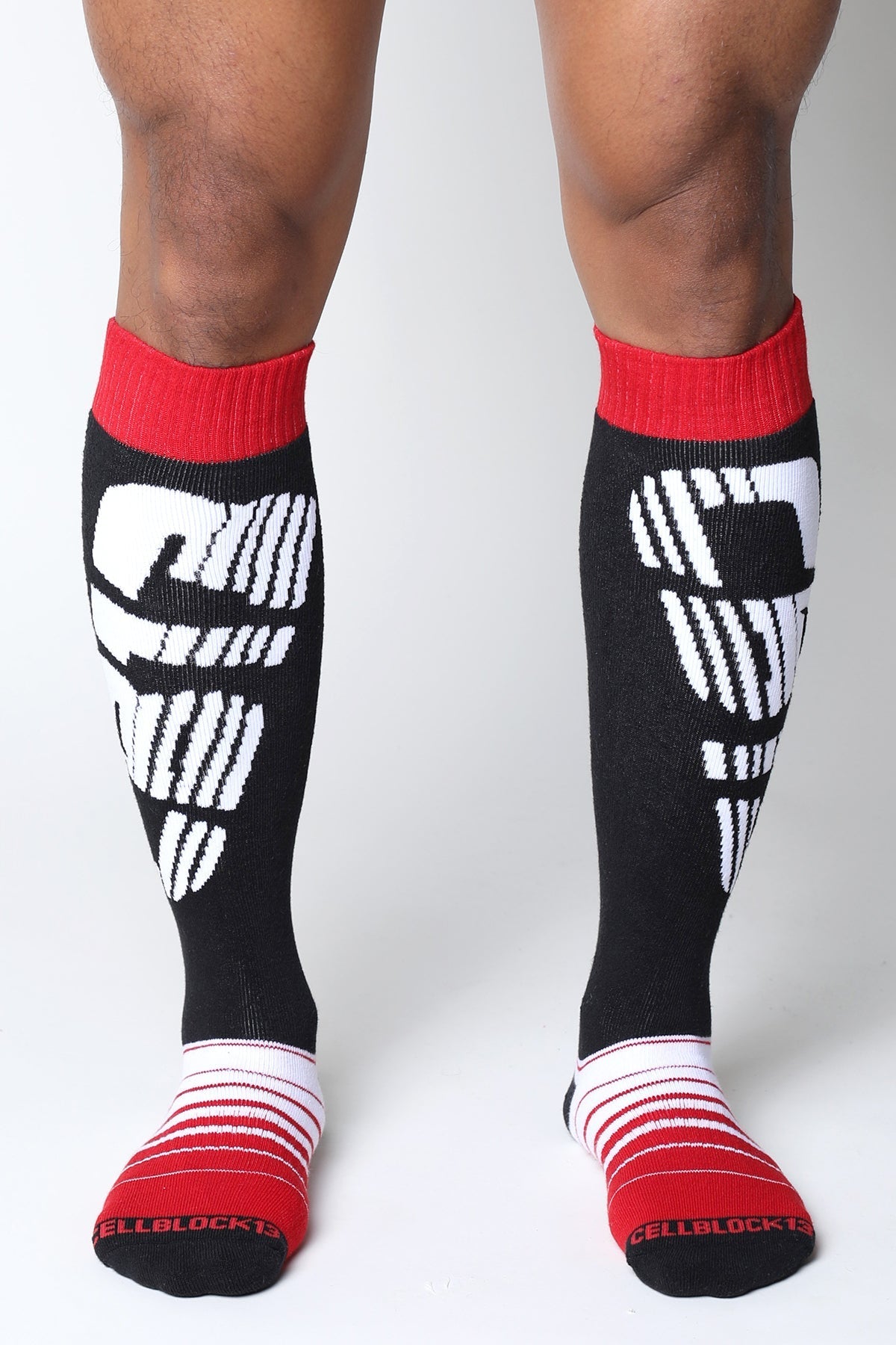 Velocity 2.0 black knee high socks with white cellblock 13 logo and red ribbed cuffs and toe sections